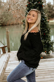 Rockin’ around the Christmas Tree Black distressed sweater